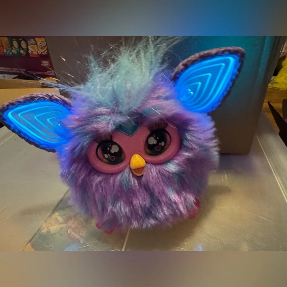Purple tie dye furby Like new condition interactive, talks lights up & moves